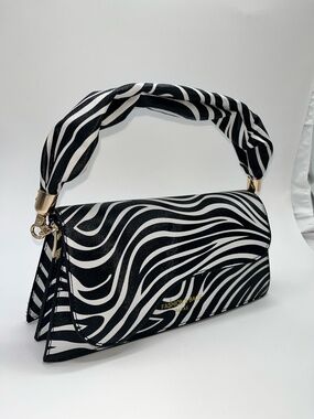 Metropolitan Candy Zebra Print Baguette Purse Statement